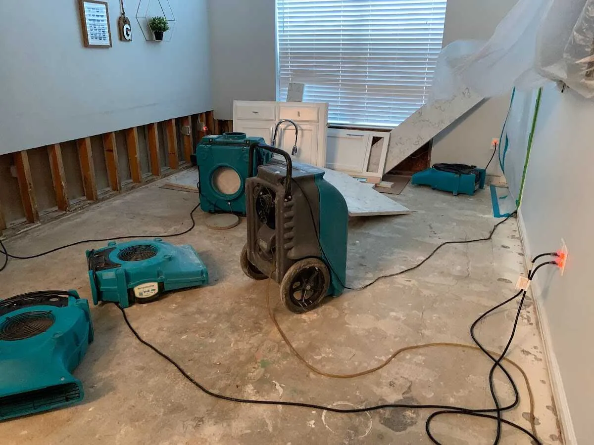 Dehumidifier in flood-cut room for Water Damage Restoration in Cleburne